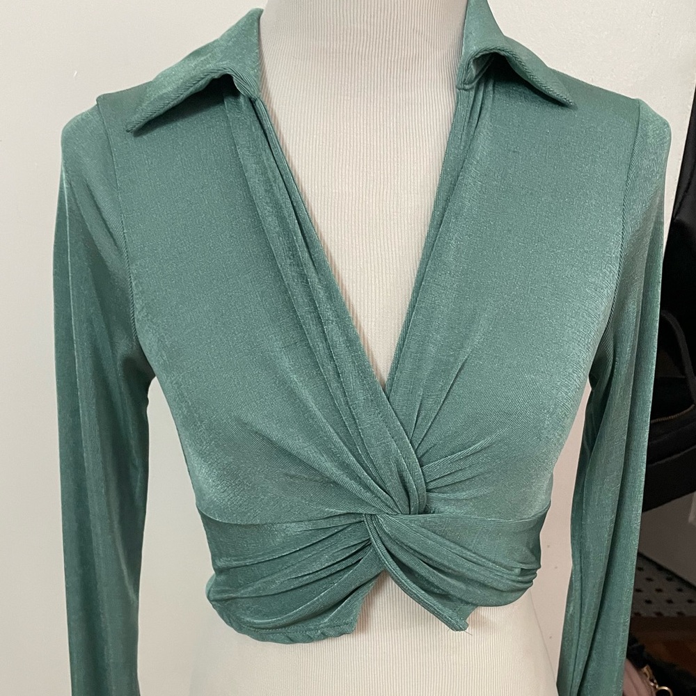 Small teal blouse